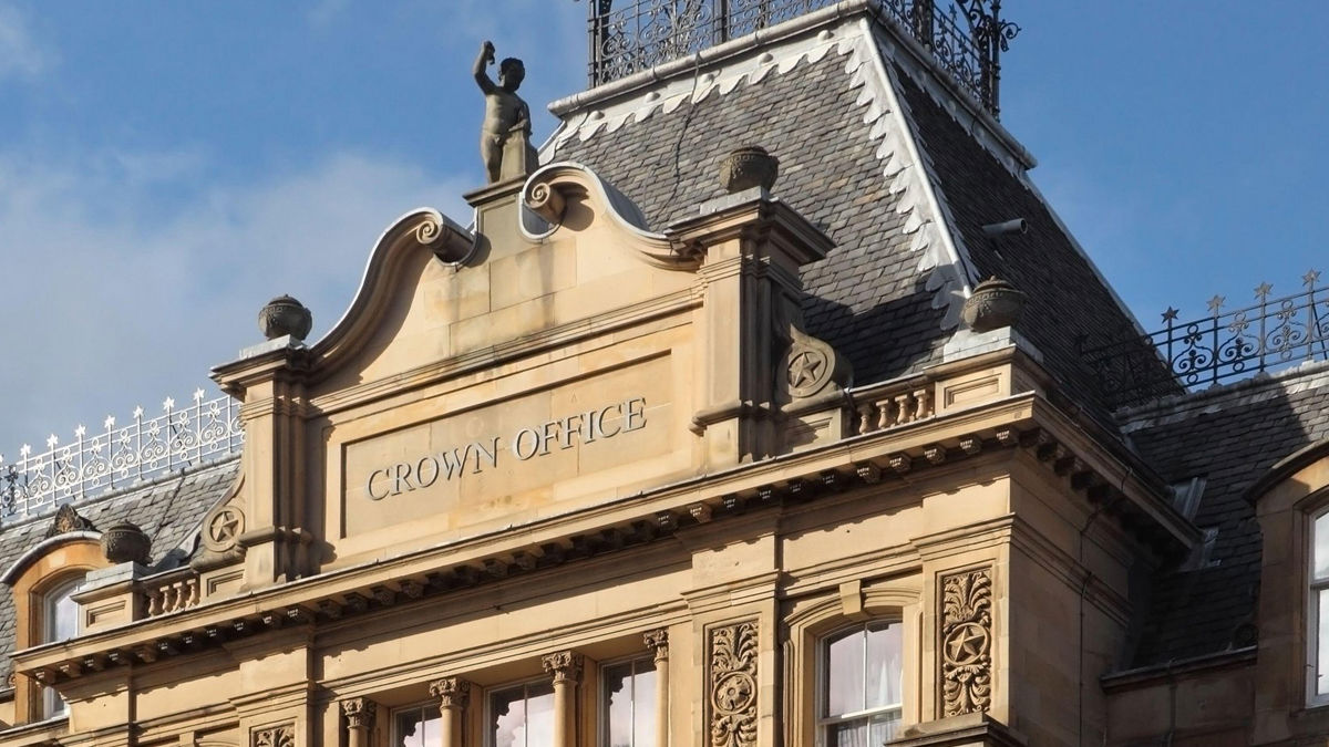 Cropped view of the frontage of the Crown Office building in Edinburgh