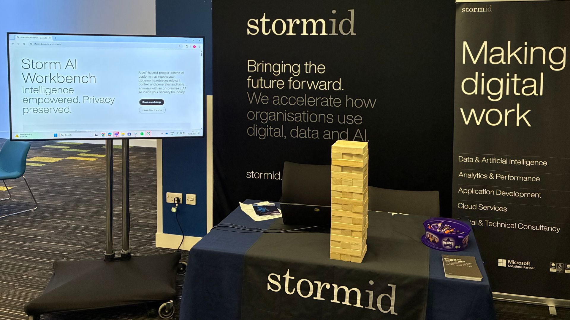 Storm ID's stall at the Futurescot Digital Justice & Policing event 2025 including material highlighting Storm's digital and AI service offerings
